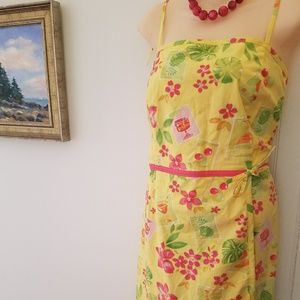 Tahiti Club yellow dress with cocktails.